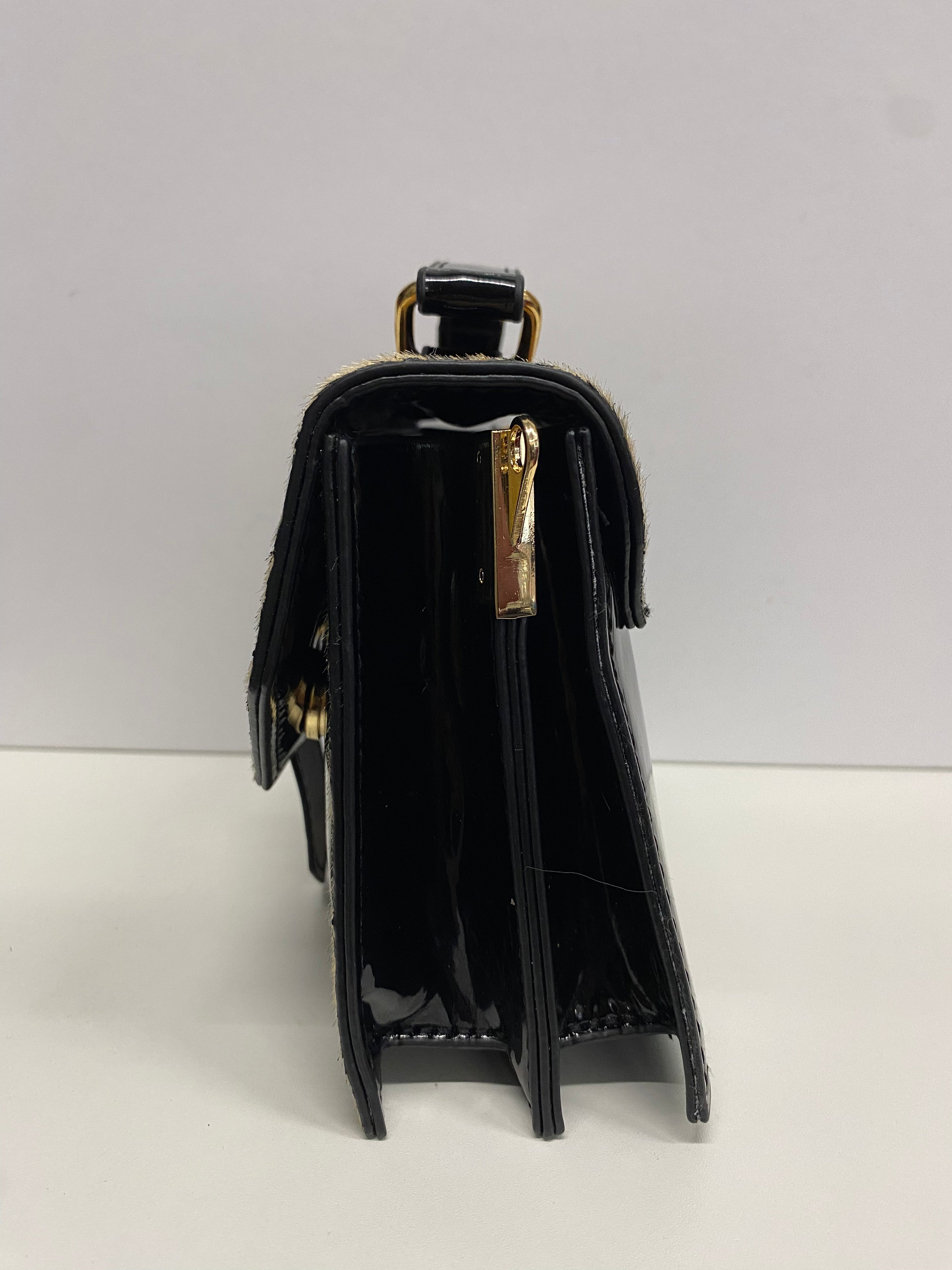 MINIBAG ELEGANTE CON STAMPA LEOPARDATA LUCIDA