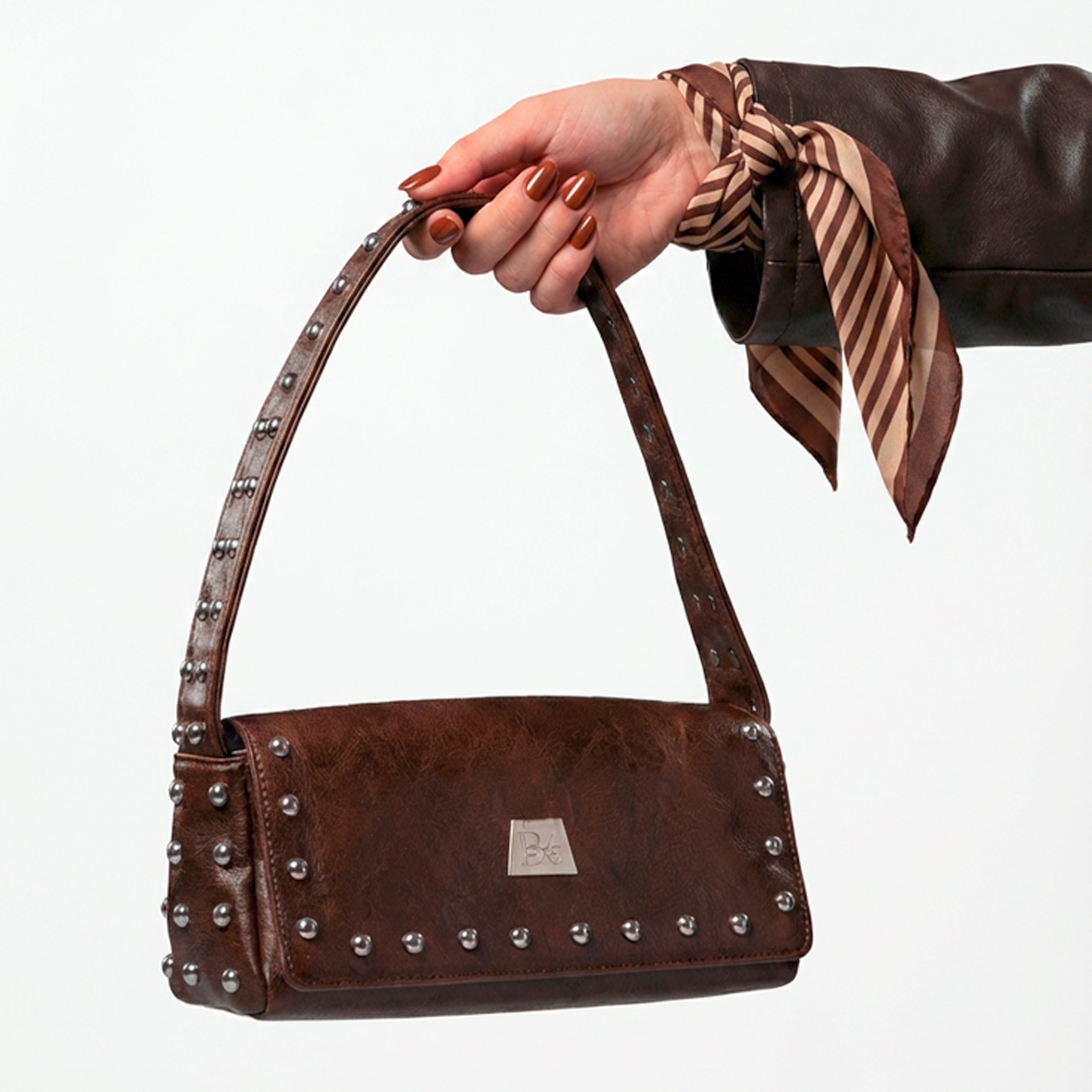 BLOCK36: MINIBAG COL MARRONE IN ECOPELLE CON BORCHIE