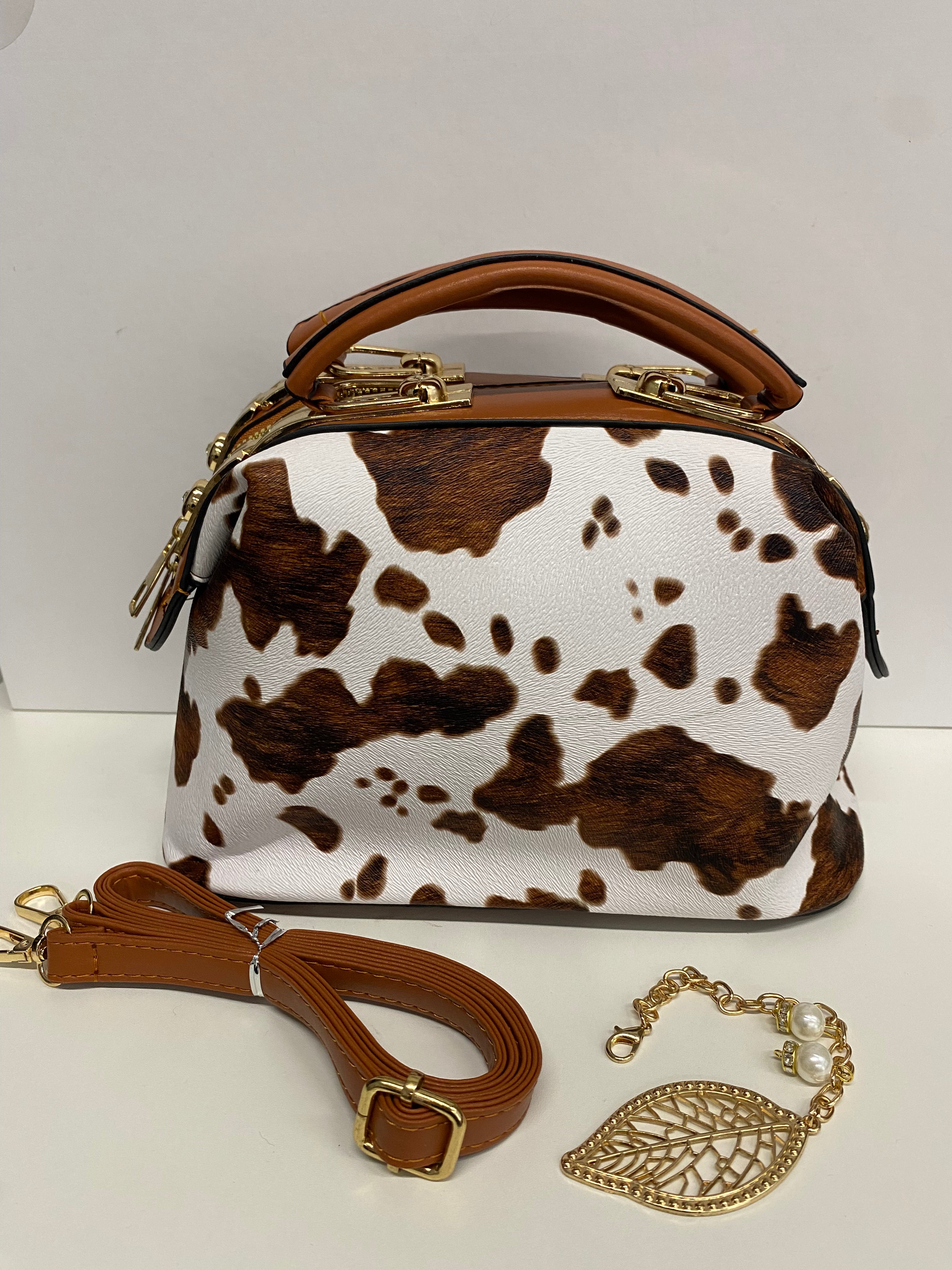 BAULETTO BIANCO E MARRONE STAMPA MUCCATO CON MANINI E TRACOLLA